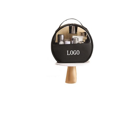 Semi-circular hand-held toiletry bag