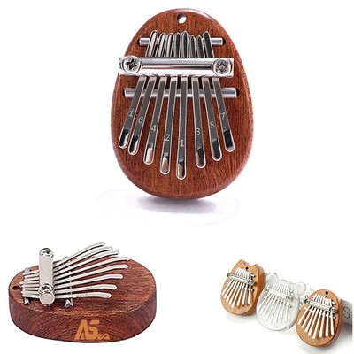 8 Keys Thumb Portable Piano