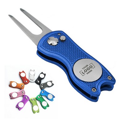 Golf Divot Tool with Pop-up Mechanism.