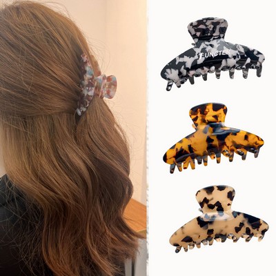 Acetic acid hair claw with leopard print