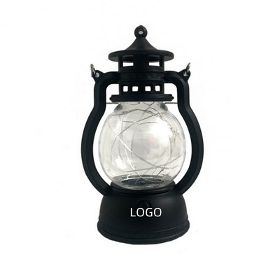 A Handheld Kerosene Lamp With A Battery