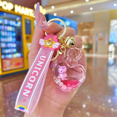 Pink Heart-shaped Perfume Bottle Keychain with Cat